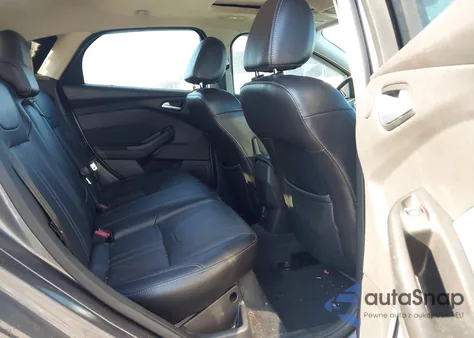 2014 Ford Focus Titanium z USA, uszkodzony, nr VIN 1FADP3N26EL190505